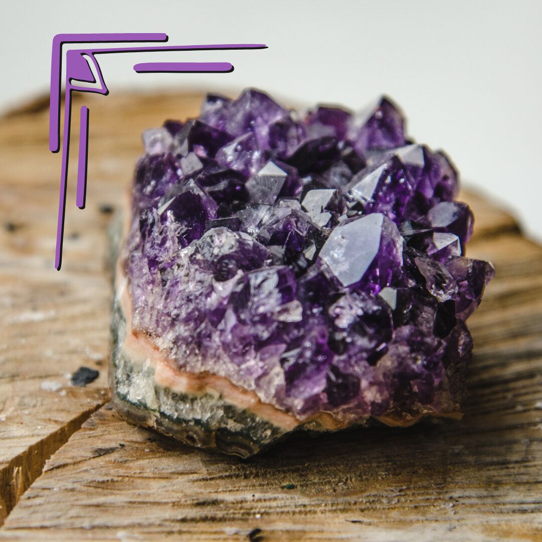 A piece of amethyst on a wooden background