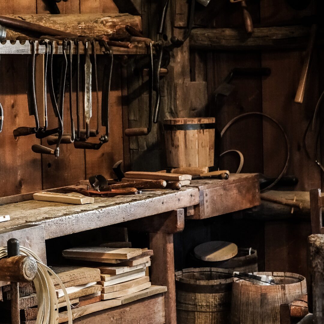 a workbench, tools racked and neat, prepared for work