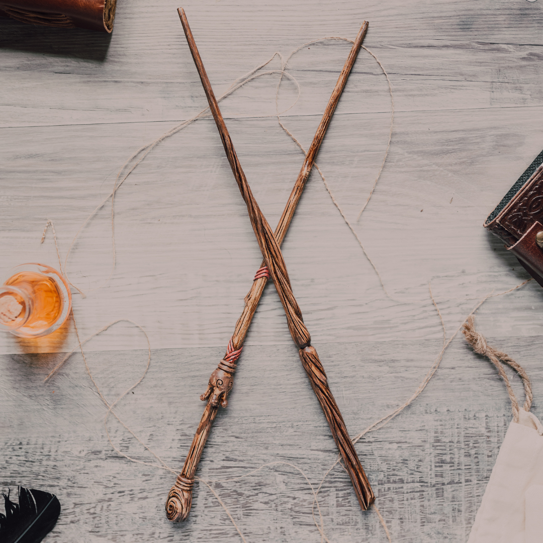 two wands, crossed